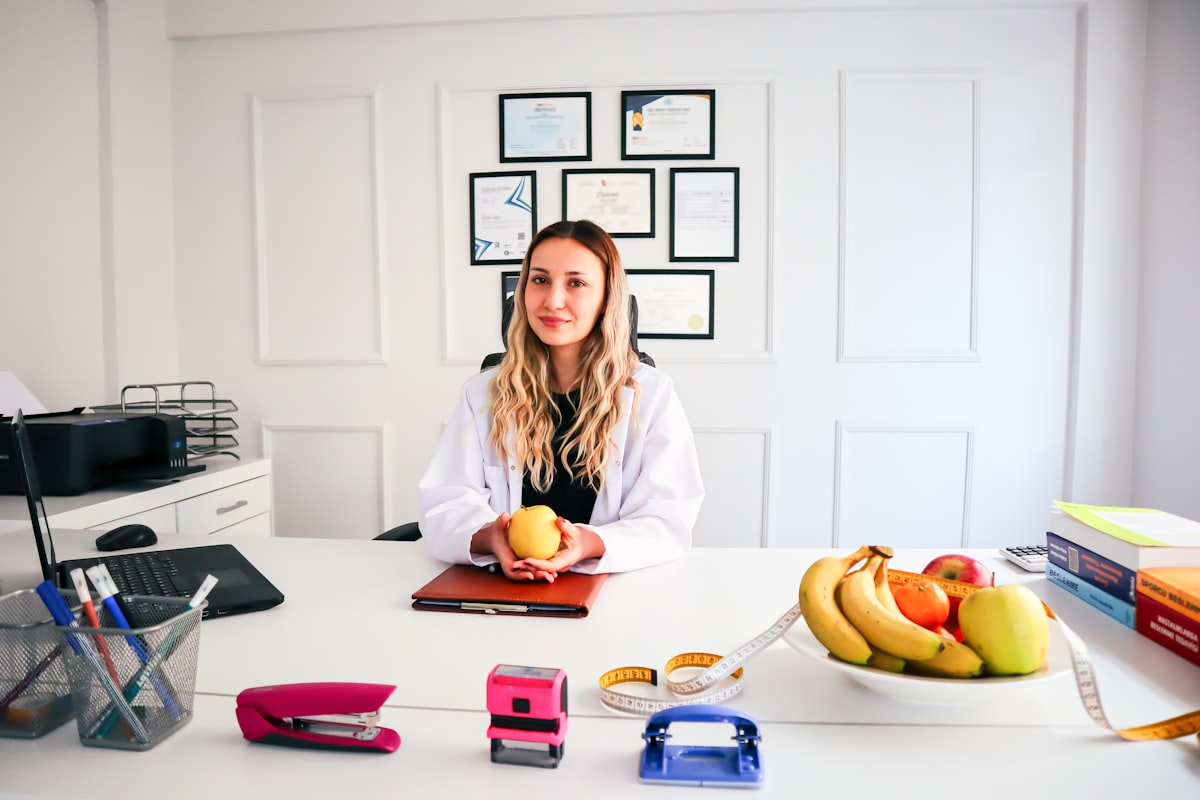 Nutritionist reviewing meal plans with client